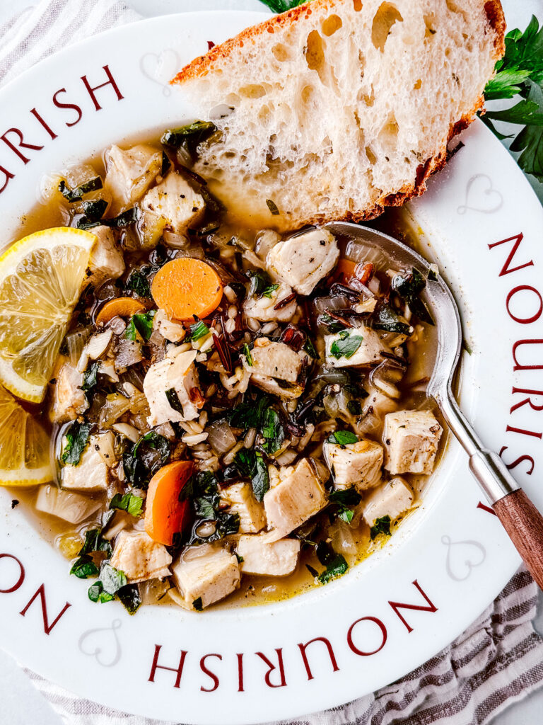 A comforting turkey and wild rice soup loaded with vegetables, highlighting a zero-waste approach to leftovers recipes.