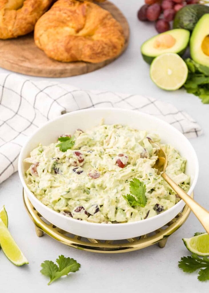 A creamy avocado turkey salad with grapes and cilantro, made from leftover turkey, showcasing a zero-waste approach to leftovers recipes.