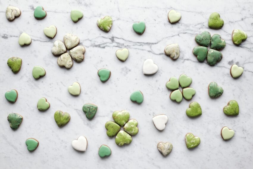 green cupcakes on a white surface