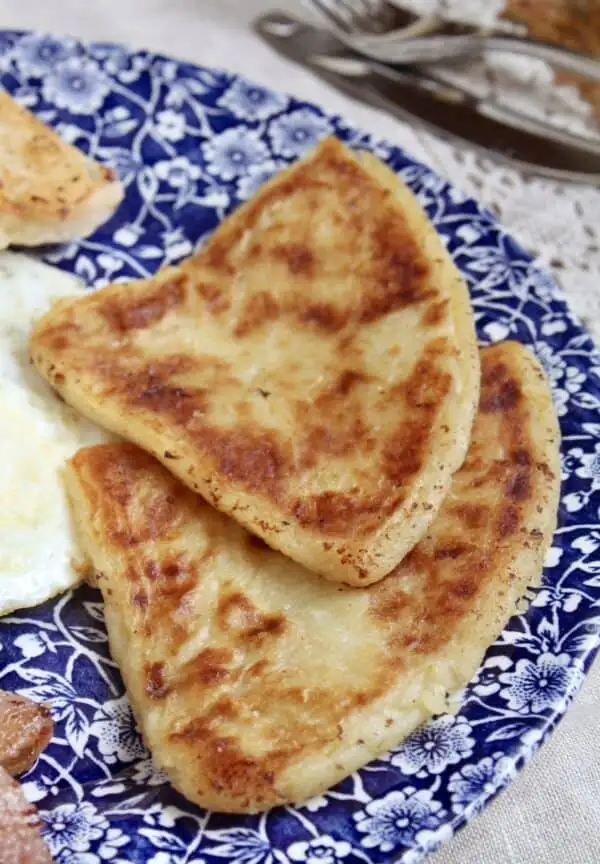 Golden-brown Irish potato farls, perfectly crispy and soft, a comforting and traditional addition to your Irish party food menu.