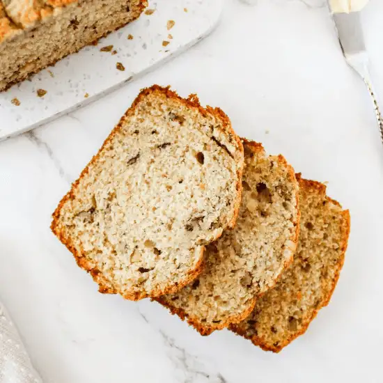 A moist and fluffy farm-to-table meal featuring homemade sourdough discard banana bread, made with ripe bananas and locally sourced ingredients from the farmers market for a delicious and budget-friendly treat.
