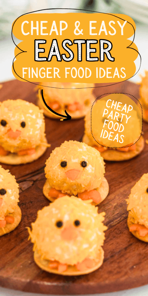 Adorable cheese ball chicks on crackers arranged on a wooden board — cheap and easy Easter finger food ideas perfect for an Easter party or cheap party food spread.