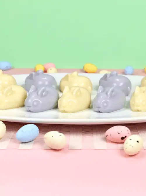 Adorable pastel-colored chocolate bunnies, perfect for easy Easter finger food ideas. A sweet and festive treat for holiday dessert tables and spring celebrations!