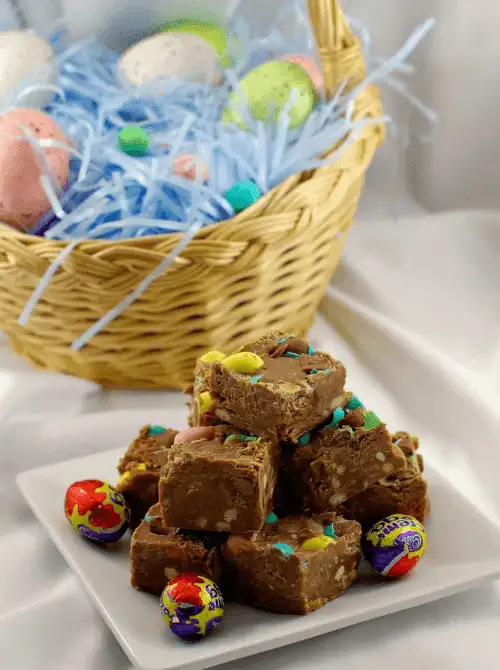 Creamy Easter fudge loaded with chocolate and colorful candy eggs—perfect for easy Easter finger food ideas and a festive holiday treat!