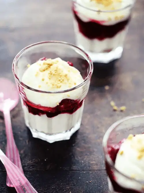 Individual no-bake cherry cheesecake dessert cups layered with cherry pie filling and crushed graham crackers—an easy 4th of July dessert that’s simple, festive, and perfect for summer parties.