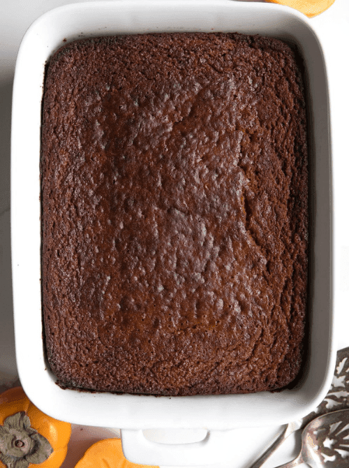 A rich and moist pumpkin spice sheet cake, perfect for fall gatherings and a great example of what to make with leftover pumpkin puree in pumpkin cakes and cupcakes.
