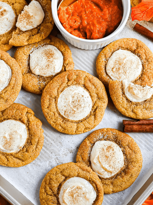 Pumpkin cookies with cream cheese centers made from leftover pumpkin puree—an easy fall treat for anyone wondering what to make with leftover pumpkin puree.