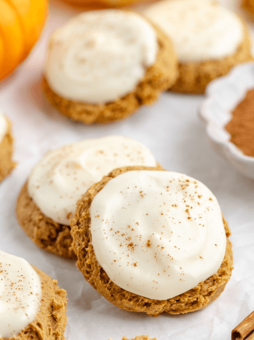 Soft pumpkin cookies with cream cheese frosting made from leftover pumpkin puree—an easy fall dessert idea for what to make with leftover pumpkin puree.