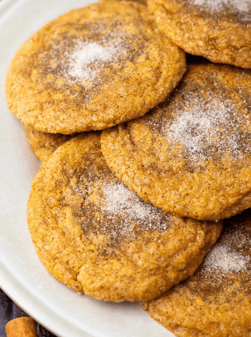 Pumpkin snickerdoodle cookies with cinnamon sugar topping made from leftover pumpkin puree—perfect for fall baking and ideas on what to make with leftover pumpkin puree.