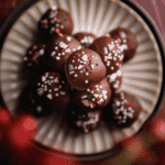 Chocolate Christmas truffles topped with festive sprinkles, a homemade DIY Christmas gift and easy edible gift idea for the holiday season.