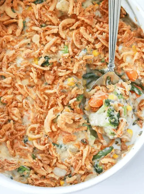 Creamy mixed vegetable casserole topped with crispy fried onions—an easy, crowd-pleasing addition to Budget-Friendly Thanksgiving Vegetable Sides.