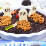 Assorted Halloween-themed chocolate-dipped Oreo cookies decorated with colorful orange, green, purple, and black sprinkles, perfect for no-bake Halloween treats.