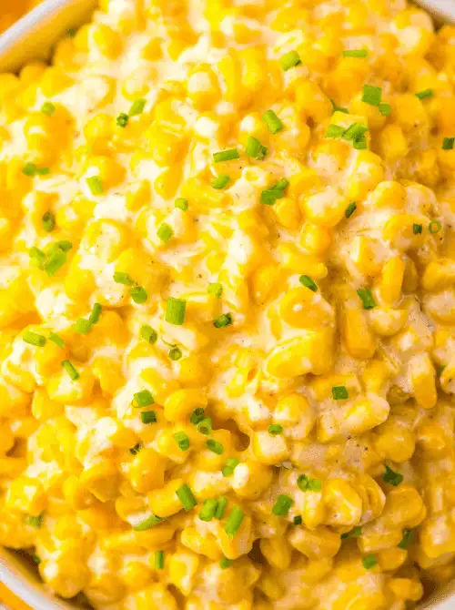Creamy corn casserole topped with fresh chives, bursting with buttery sweetness—this Budget-Friendly Thanksgiving Vegetable Side is a must-have comfort dish.