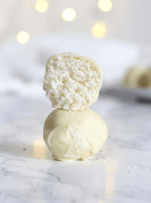 White chocolate snowball truffles with a coconut filling, a festive DIY Christmas gift and easy edible gift idea for the holiday season.