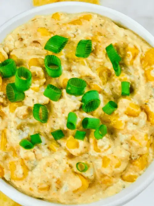 Crockpot crack corn dip with sweet corn and green onions in a creamy cheese base—a crowd-pleasing favorite for Party Dips for the Holidays and Cheesy Dips.
