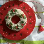 Party Dips for the Holidays: Global-Inspired, Spicy Dips, and Unique Twists Bacon scallion cheese dip shaped like a holiday wreath and garnished with parsley and red peppers, a festive option for Party Dips for the Holidays with Unique Twists.