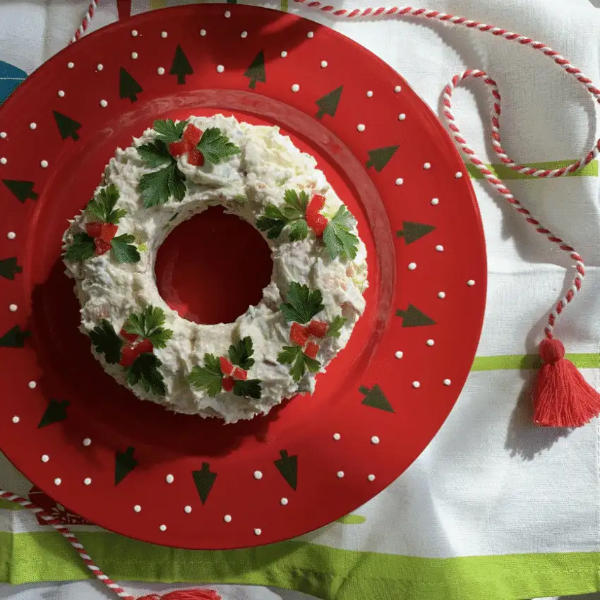 Bacon scallion cheese dip shaped like a holiday wreath and garnished with parsley and red peppers, a festive option for Party Dips for the Holidays with Unique Twists.