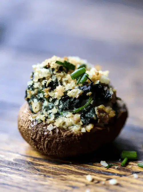 Vegan Stuffed Mushrooms filled with spinach and dairy-free ricotta — a flavorful, make-ahead appetizer for Christmas party food ideas that’s easy to prepare, budget-friendly, and perfect for vegan holiday entertaining and festive finger food appetizers.