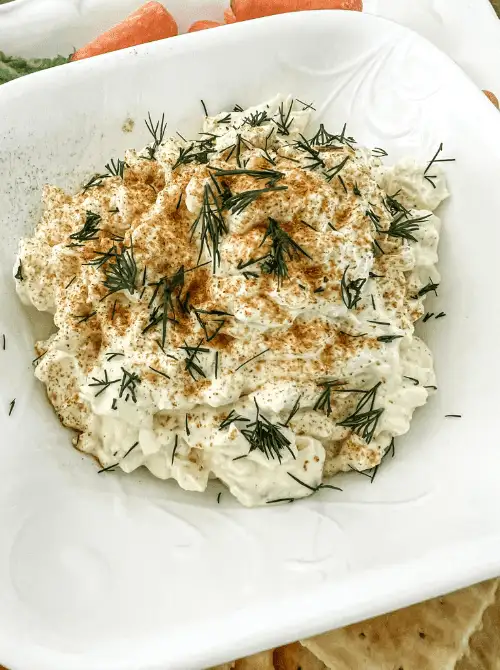 Deviled egg dip topped with paprika and fresh herbs, a last minute Super Bowl party dip recipe that’s easy to serve with veggies or crackers.