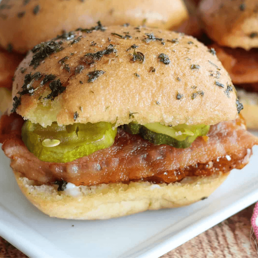 Sweet and spicy hot honey chicken sliders served on mini buns, an easy cheap tailgate food and simple Super Bowl appetizer.