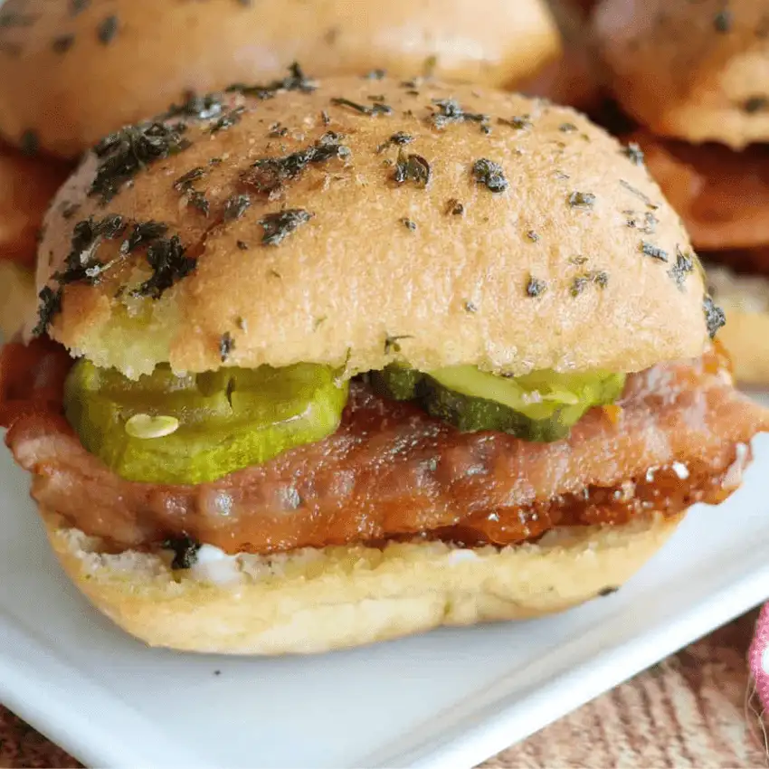 Sweet and spicy hot honey chicken sliders served on mini buns, an easy cheap tailgate food and simple Super Bowl appetizer.