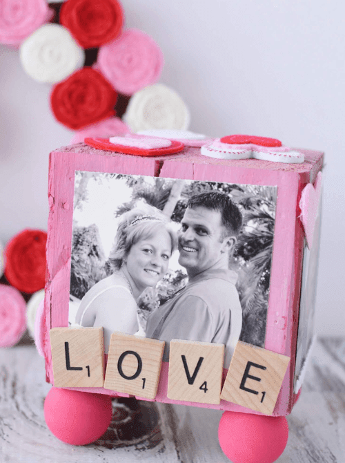 DIY Valentine photo block with family picture and ‘LOVE’ tiles, Valentine’s DIY craft made on a Dollar Tree budget.