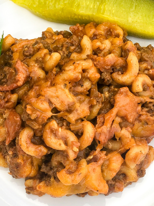 Cheesy macaroni and beef casserole with tender pasta and rich tomato sauce, a cozy comfort casseroles dish perfect for easy comfort food and recipes for busy nights.