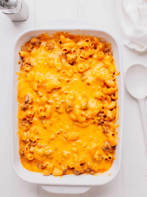 Cheeseburger casserole with seasoned ground beef and a thick melted cheddar topping, a classic comfort casseroles meal for easy comfort food and recipes for busy nights.