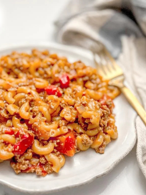 Goulash casserole with ground beef and diced tomatoes in a rich sauce, a simple comfort casseroles idea for easy comfort food and recipes for busy nights.