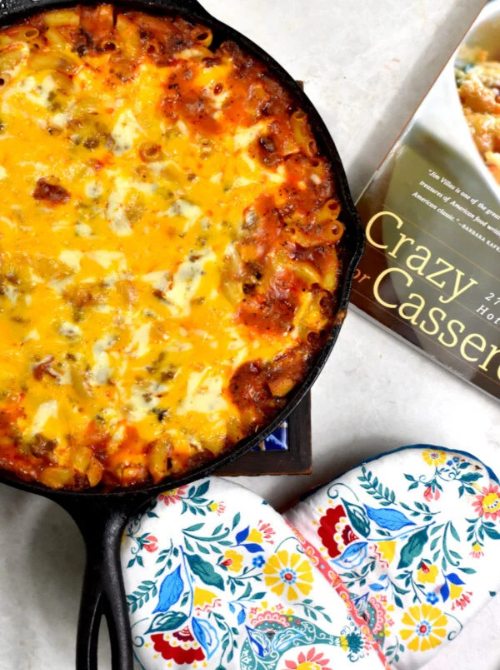 Skillet casserole with melted cheese and pasta baked to a bubbly golden finish, a cozy comfort casseroles favorite for easy comfort food and recipes for busy nights.